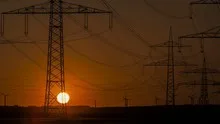 Sunset Wind Turbine and Power Lines