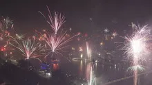Time lapse pan and tilt shot grand firework aerial New Years Eve