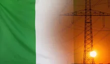 Energy Concept Nigeria Flag with sunset power pole