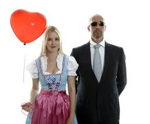 Woman In Dirndl With Bodyguard