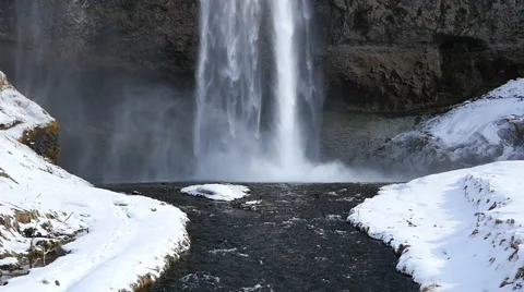 Slowmotion Seljalandsfoss Waterfall Tilt Shot