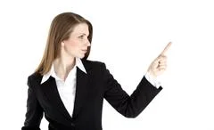 Business Woman Points At Something On The Right Side Of The Image. Isolated O
