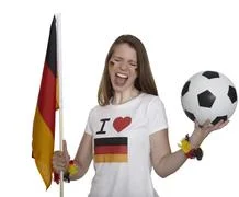 Attractive Woman Shows German Flag And Football And Screams In Front Of White