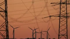 Sunset Wind Turbine And Power Lines