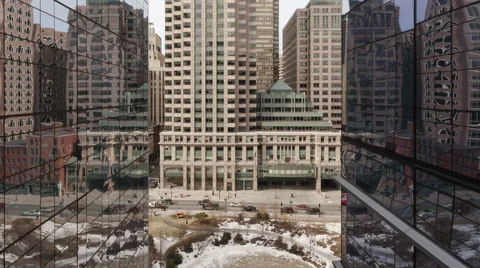4K Time Lapse Zoom Out Of Traffic On Office Building Reflection