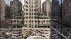 4K Time Lapse Zoom Out Of Traffic On Office Building Reflection