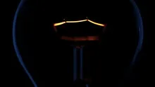 Lightbulb glowing blue outline