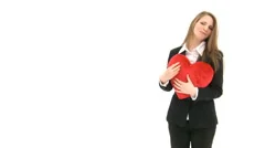 Woman Cuddling With Red Heart Pillow