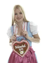 Woman with German Lebkuchen heart