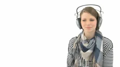 Woman Enjoys Music On Her Earphones