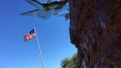 Us Flag In Slowmotion With Aircraft Silhouette