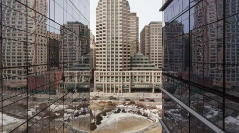 4K Time Lapse Zoom In Of Traffic On Office Building Reflection