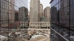 4K Time Lapse Zoom In Of Traffic On Office Building Reflection