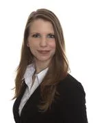 Portrait Of A Business Woman Smiling On White Background