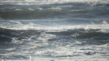 Slowmotion ocean waves breaking
