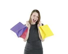 Excited Shopping Woman Shouting With Shopping Bags