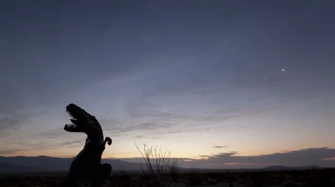 4K Time Lapse Desert Sunrise Dinosaur Silhouette