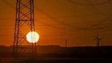 Sunset Wind Turbine and Power Lines
