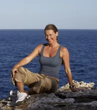 Relaxing posture on rocks near the ocean