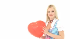 Woman Kisses Heart Ballon Before It Is Set Free