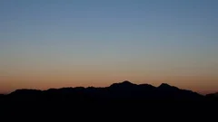 Sunrise 4K Time Lapse At Mountain Range Zoom Out