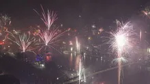 Time lapse zoom out grand firework aerial New Years Eve