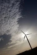 Wind Turbine With Clouds In The Sky