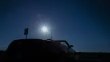 4K Time lapse zoom out convertible sun rising