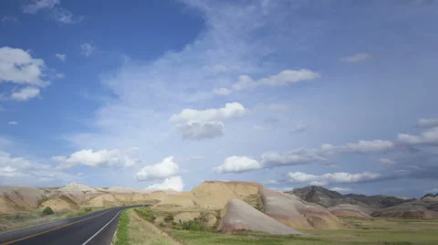 4K Time Lapse Pan And Tilt Shot Badlands Colorful Yellow Mounds