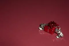 Red Gift Reflects In Glass