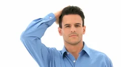 Attractive Man Runs Hand Through Hair