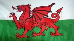 Wales Flag Slow Motion Oil Production Concept
