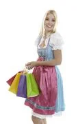 Woman In Dirndl With Shopping Bags