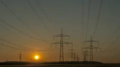 Sunset Wind Turbine And Power Lines