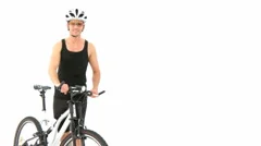Sportive Athlete Presenting Bicycle