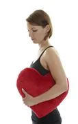 Woman With Heart Pillow