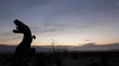4K Time Lapse Close Up Desert Sunrise Dinosaur Silhouette