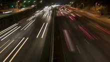 4K Time lapse zoom out freeway light trails at night