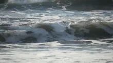 Slowmotion ocean waves breaking