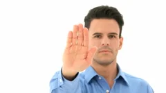 Man Shows Stop Sign With Hand