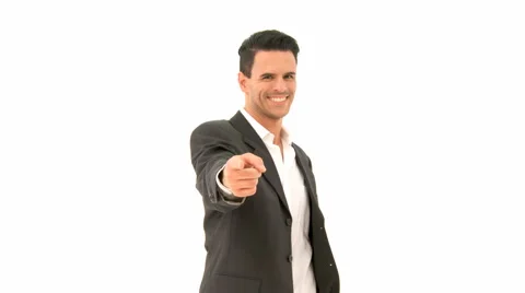Businessman In Suit Smiling And Pointing