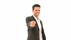 Businessman In Suit Smiling And Pointing