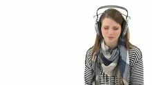 Beautiful woman listening to music with headphones