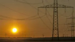 Sunset Wind Turbine And Power Lines