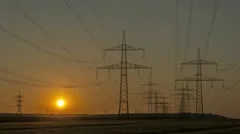 Sunset Wind Turbine And Power Lines