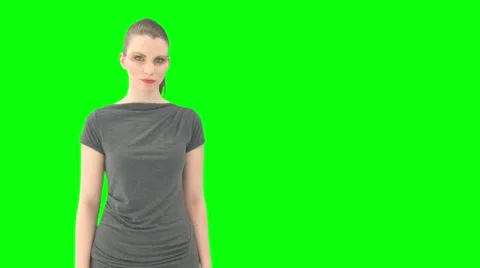 Woamn Pointing At Copyspace Greenscreen