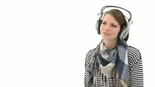 Beautiful woman listening to music with headphones