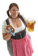 Bavarian Girl Cheers With A Beer