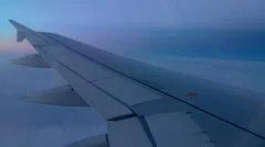 Airplane Wing Above The Clouds