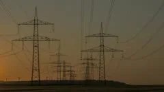 Sunset Wind Turbine And Power Lines